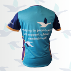 Blue and purple t-shirt back: &amp;quot;helping to provide care and support when needed most!&amp;quot; with bird logo.