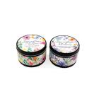 Two round floral candles, &amp;quot;Springtime Meadow&amp;quot; and &amp;quot;Springtime Blossom&amp;quot; labeled.