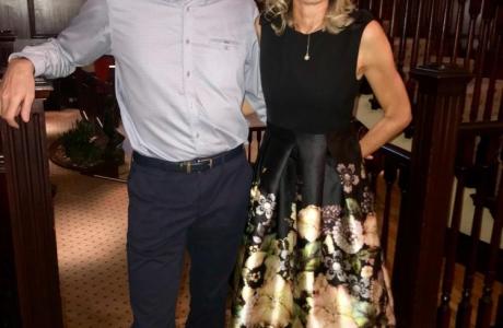 John and Jane at John's birthday celebration happily smiling