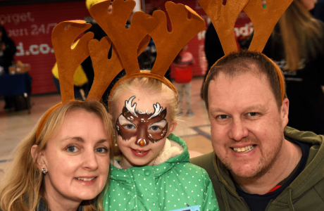 Charlotte, her daughter and husband taking part in the Reindeer Run