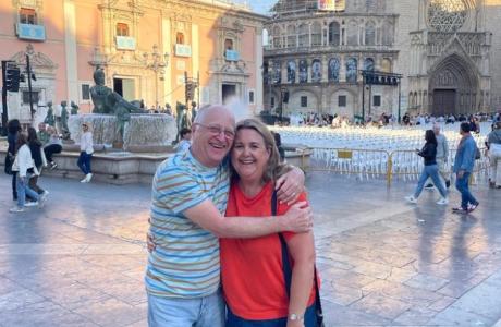 Steve and Nicola embracing on holiday together