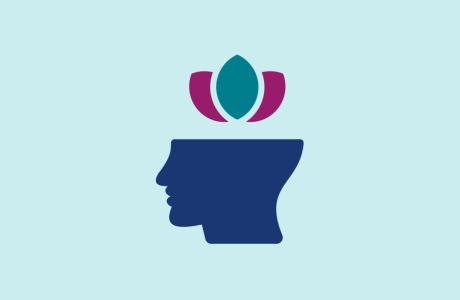 Mindfulness graphic: dark blue head silhouette with a magenta and teal lotus.