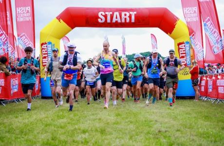 Runners excitedly running at the startline