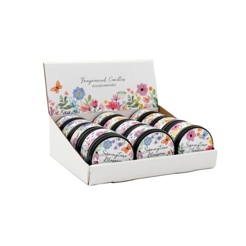 Display of twelve 'Springtime Blooms' fragrant candles in floral tins.