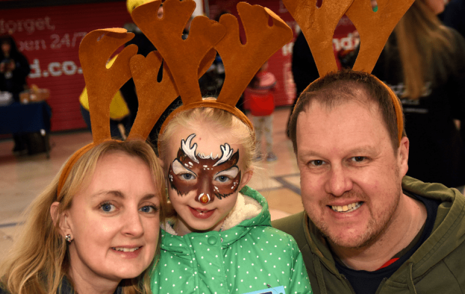 Charlotte, her daughter and husband taking part in the Reindeer Run