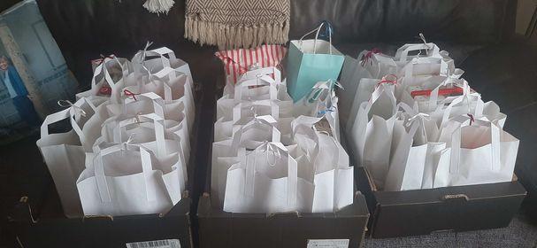 Serena's gift bags, including two with blue ribbons for our male nurses