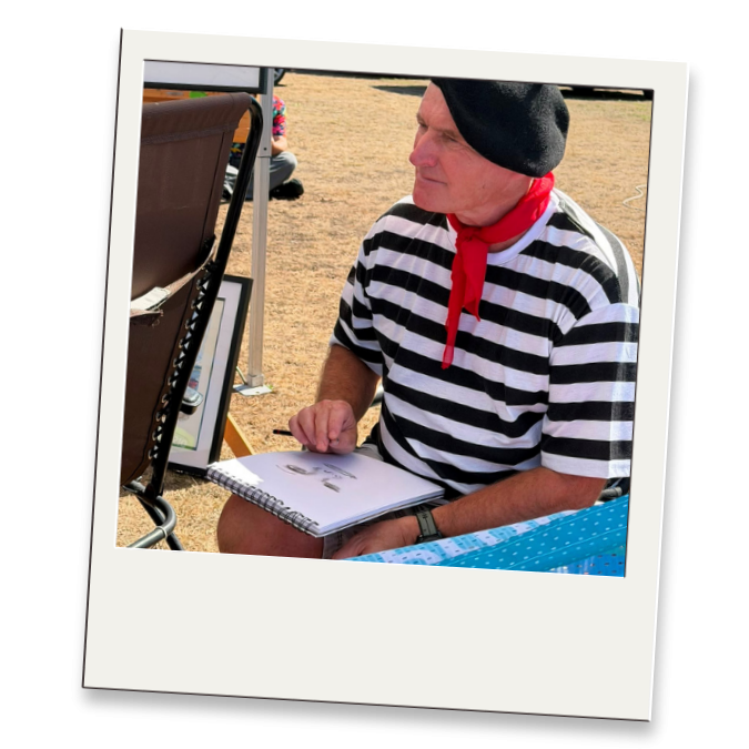 Photograph of one of the fundraisers sketching
