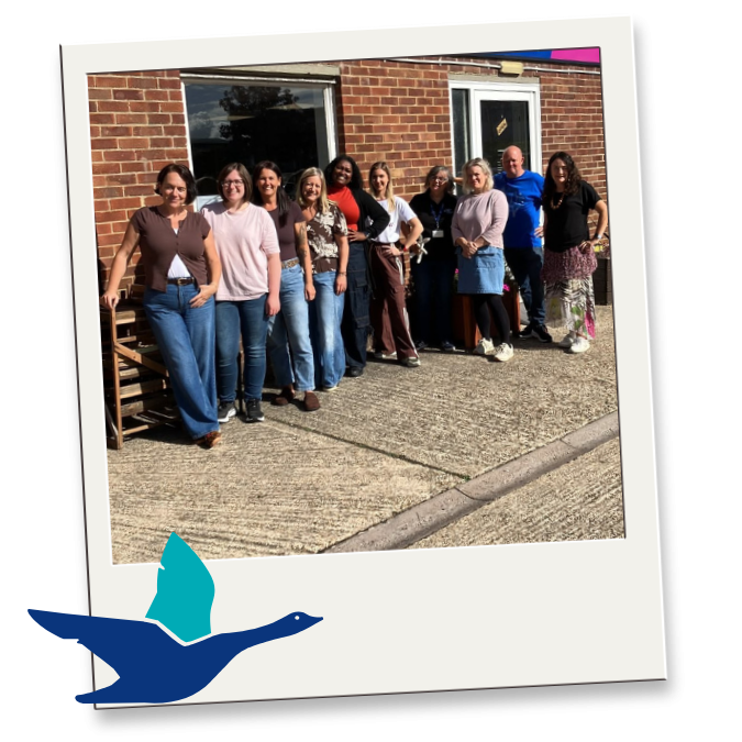 The team having a photo outside the Donation Centre