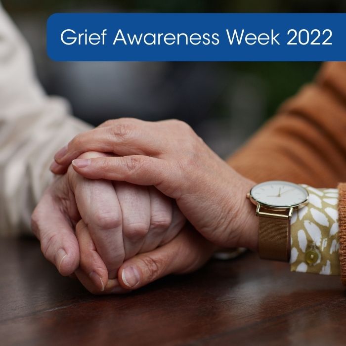 Grief Awareness Week - two people holding hands