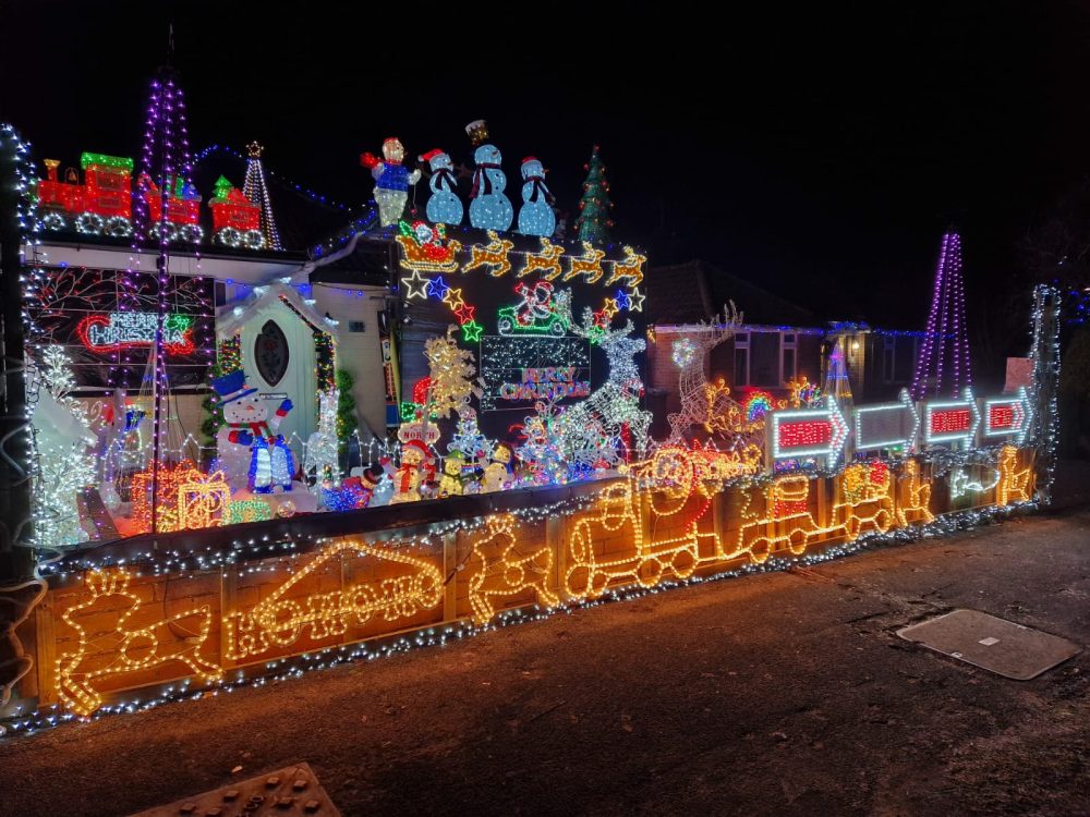 Image of a house lit up with beautiful lights for Christmas