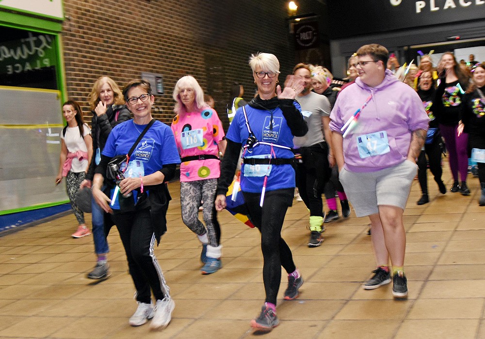 Group of people taking on Moonlight Walk in 2022