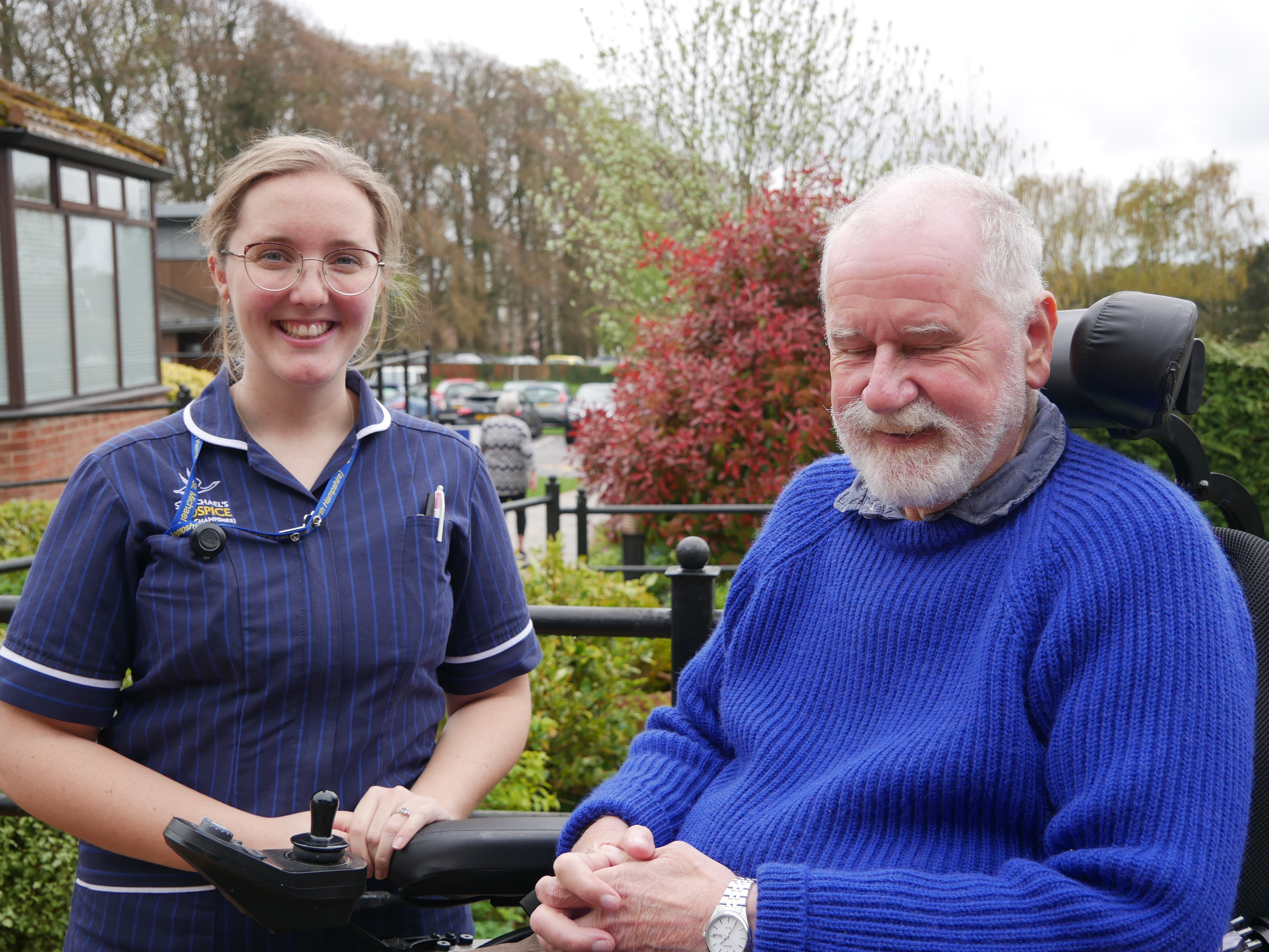 Image of Ellie with Simon, a patient from the Hospice.