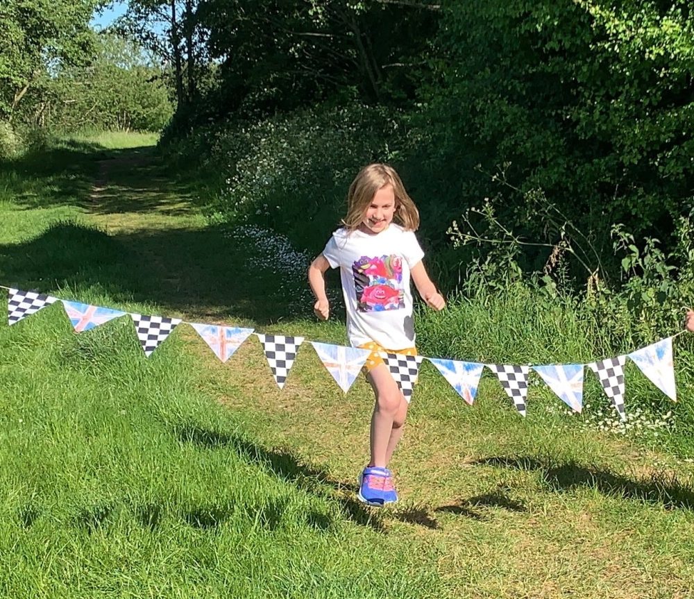 Sophie crossing the finish line