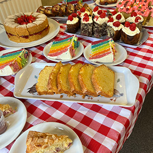 Image of lots of cakes on a table