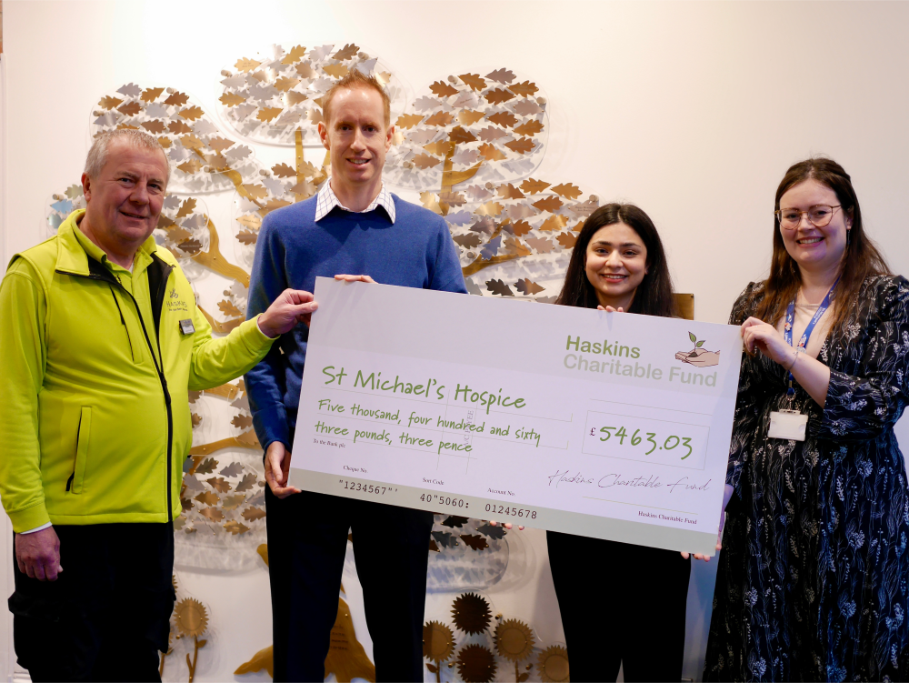 Photograph of cheque presentation