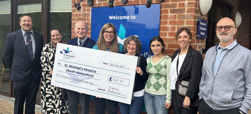 Photograph of a giant cheque. being presented to us